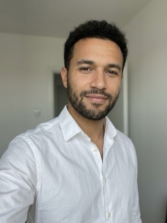 The input photo: an AI-generated adult, not a real person